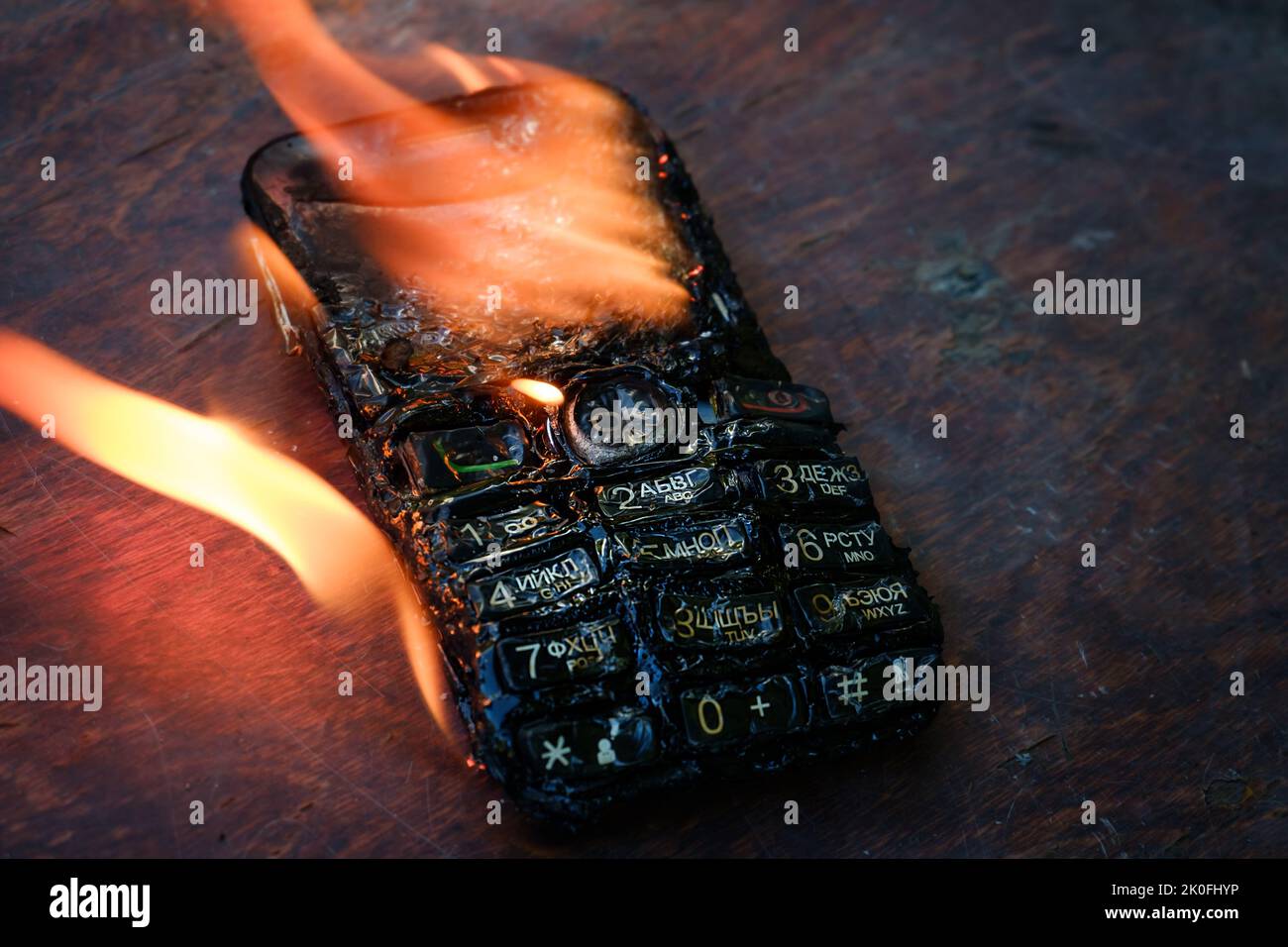 Burning red phone fire hi-res stock photography and images - Alamy