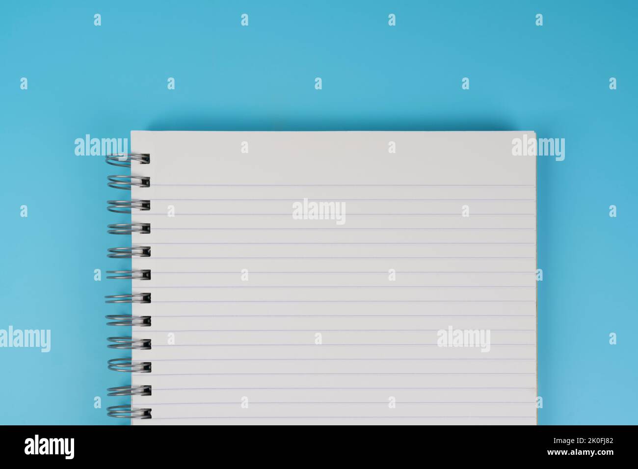 a notebook with a spiral and lined sheets Stock Photo