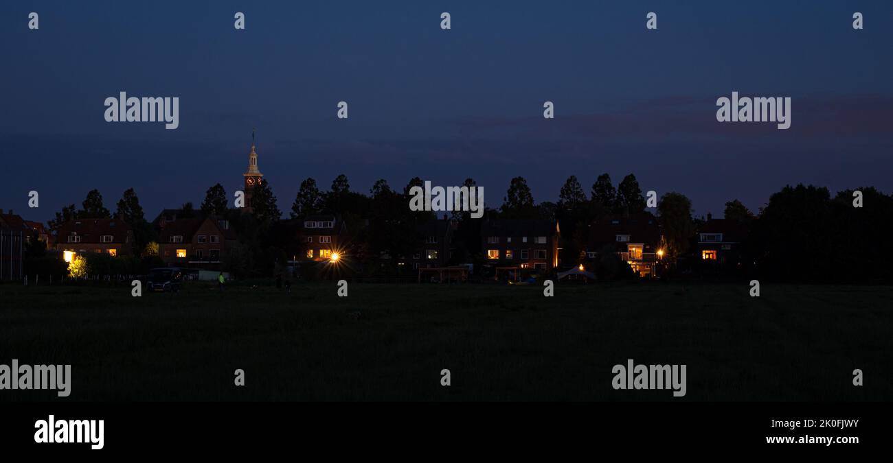 Panoramic night view of Hazerswoude-Dorp, a village in the western part of The Netherlands Stock Photo