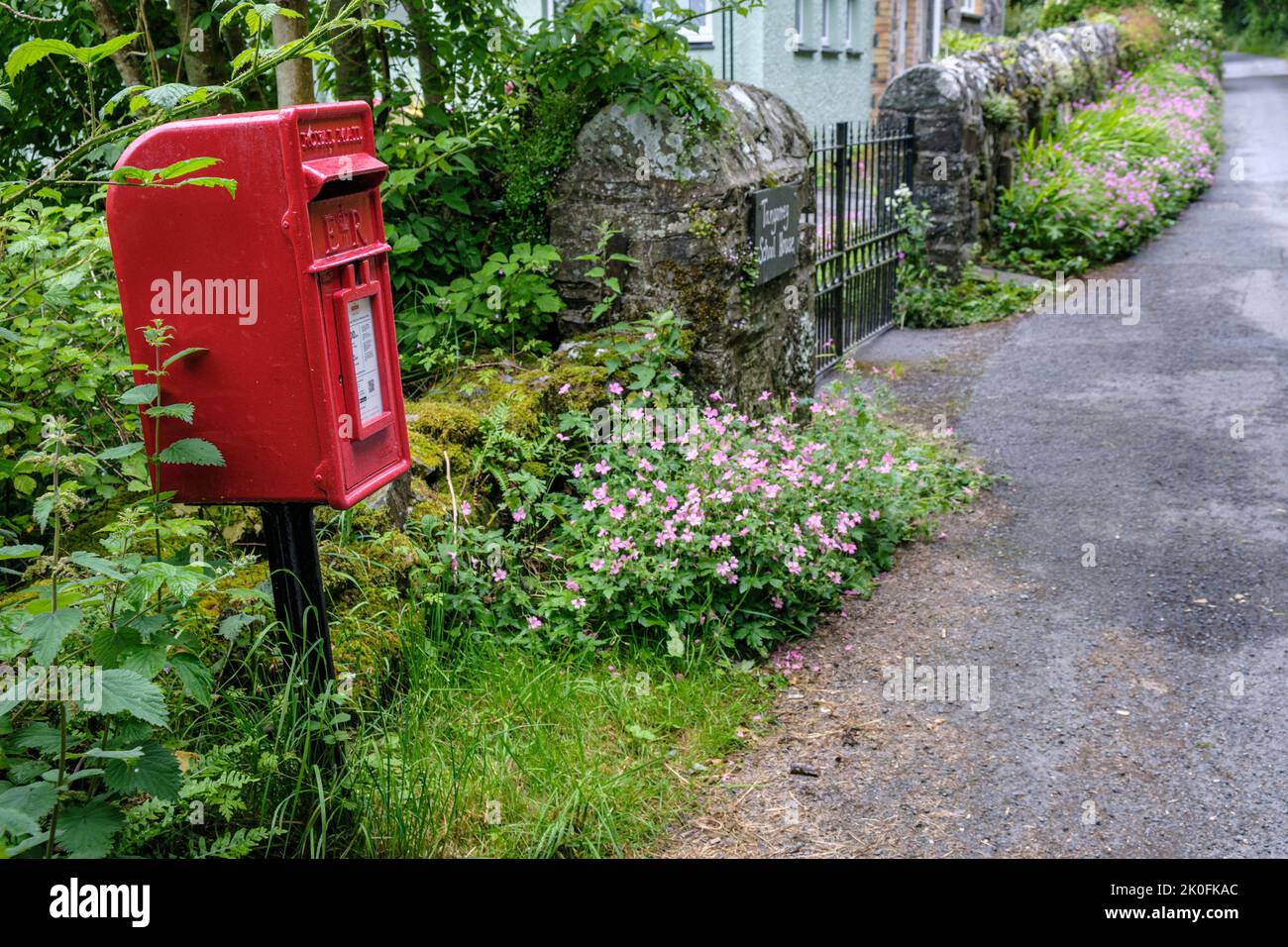 A rural post box by the former Tangarreg school near Blaenpennal, Ceredigion, Wales Stock Photo