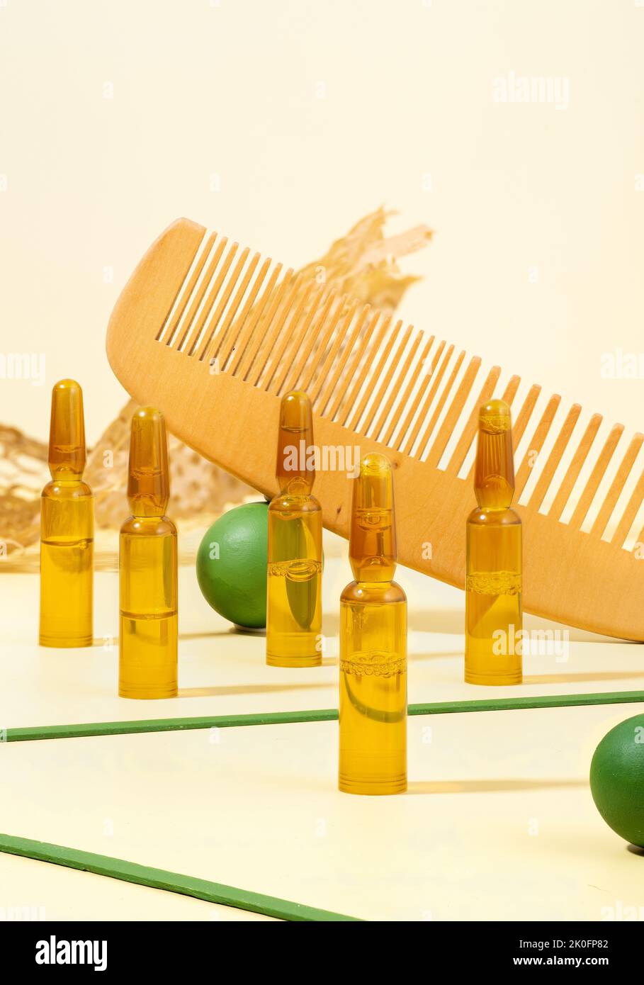 Modern Creative still life photo. Cosmetic ampoules with serum for hair