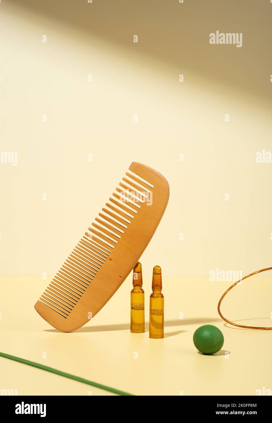 Modern Creative still life, balance photo. Cosmetic ampoules with serum for hair growth