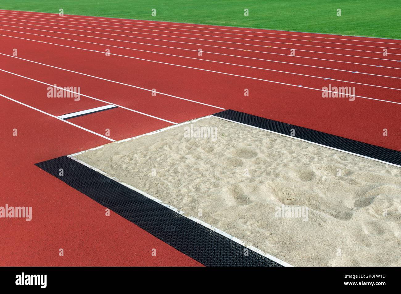 Long jump pit in Aa stadium. Horizontal sport theme poster, greeting