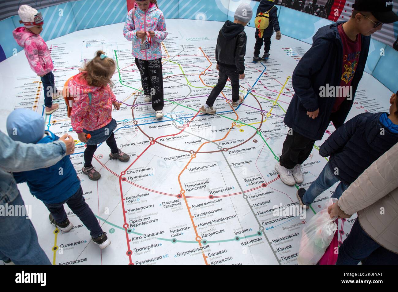 Moscow, Russia. 11th of September, 2022. children are considering the scheme of the Moscow metro system during celebrations marking the 875th birthday of Moscow city in Tverskaya Street, Russia. Nikolay Vinokurov/Alamy Live News Stock Photo