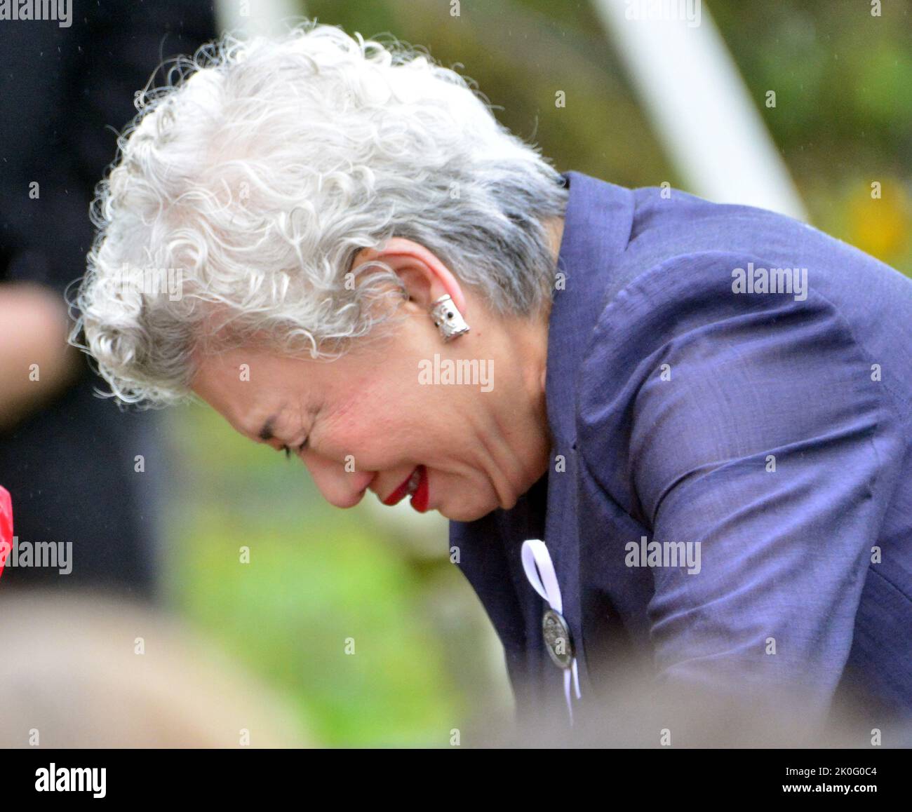 Shanksville, United States. 10th Sep, 2022. Yachiyo Kuge of Osaka Japan, who's son was a victim of the Flight 93 crash cries after saying his name during the ringing of the Bells during the 21th Annual Remembrance Ceremony at the Flight 93 National Memorial on Sunday, September 11, 2022 near Shanksville, Pennsylvania . Photo by Archie Carpenter/UPI Credit: UPI/Alamy Live News Stock Photo