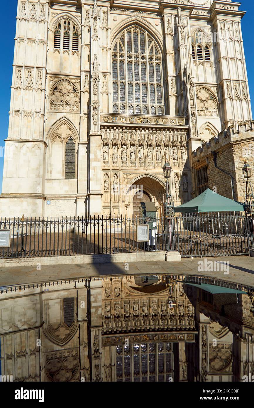 Mirror reflections of Westminster Abbey in London Stock Photo