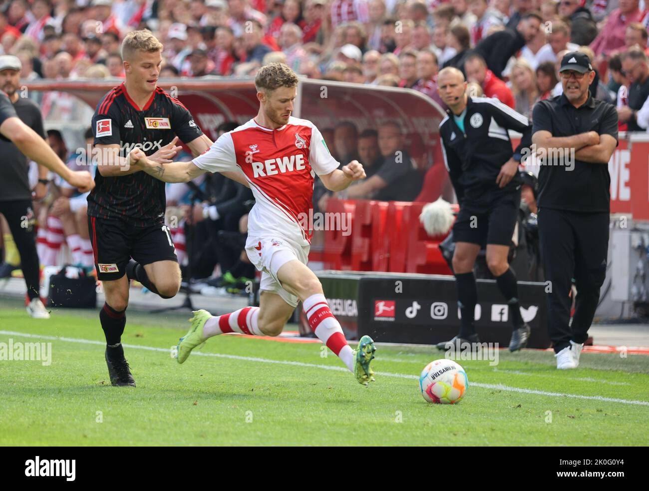 Cologne, Germany. 11th Sep, 2022. Bundesliga, matchday 6, 1. FC Cologne - 1. FC Union Berlin, Andras Schaefer (Union), Florian Kainz (Koeln) battle for the ball. Credit: Juergen Schwarz/Alamy Live News Stock Photo