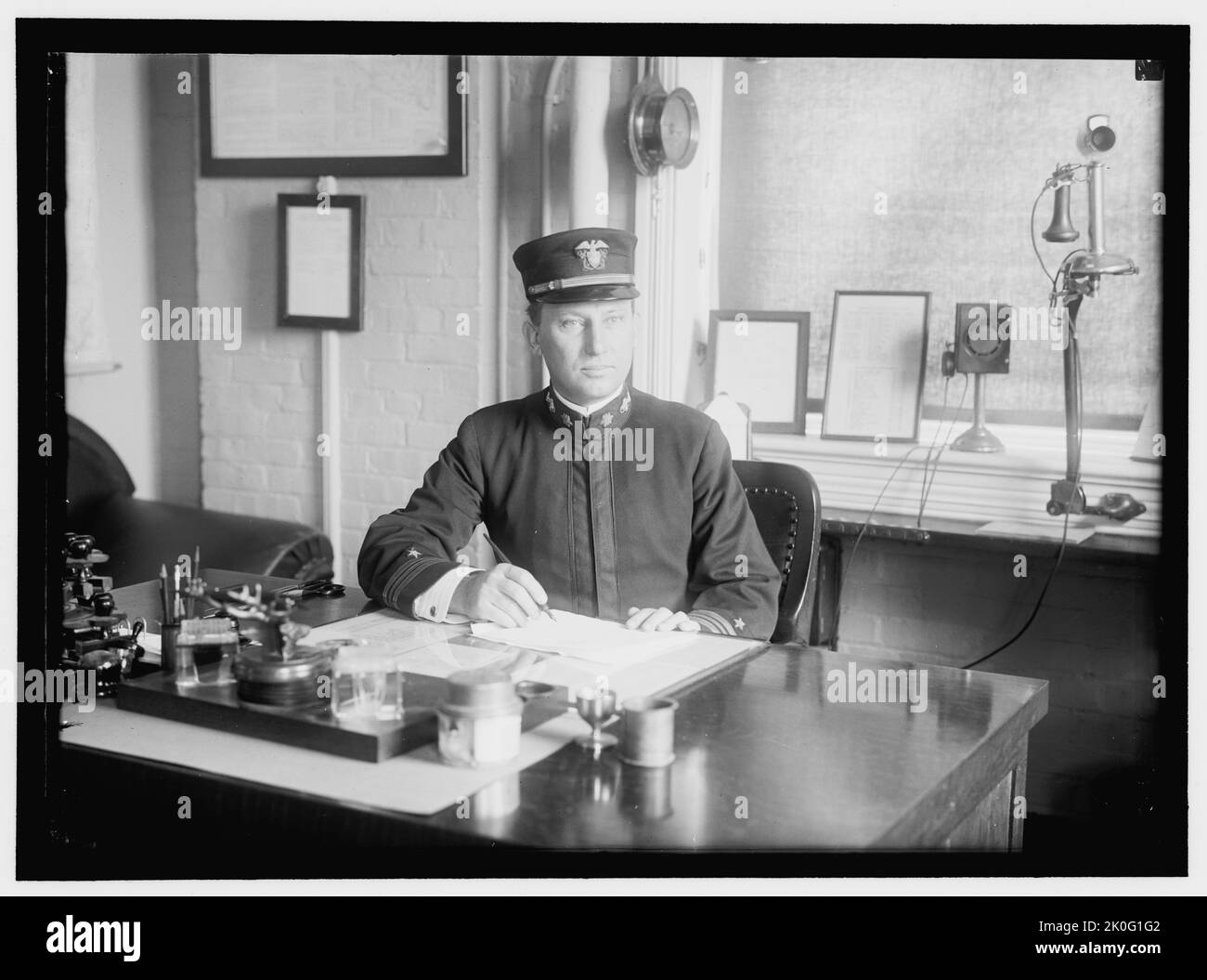 Captain William, between 1910 and 1917. Man in uniform writing at a desk. Stock Photo