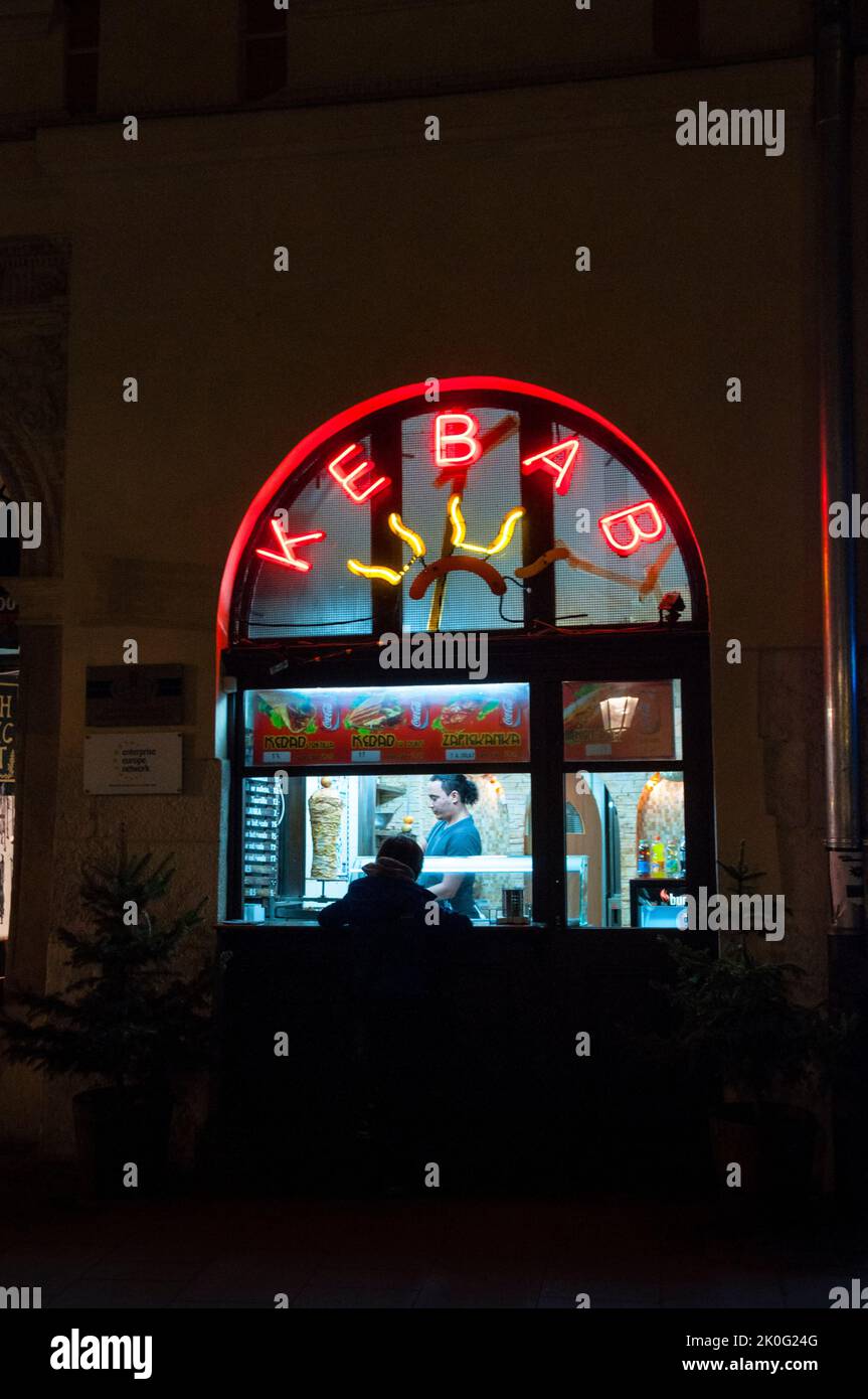 Neon arch and lettering of a Kebab Shop in Old Town Krakow, Poland. Stock Photo