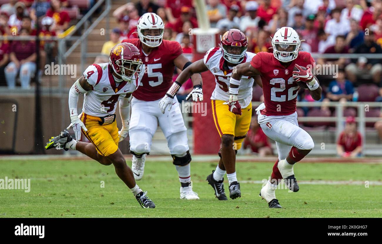 Stanford Stadium. 10th Sep, 2022. CA U.S.A. Stanford running back E.J. Smith (22) runs away from Trojans defenders for a long gain during the NCAA Football game between USC Trojan and the Stanford Cardinal. USC beat Stanford 41-28 at Stanford Stadium. Thurman James/CSM/Alamy Live News Stock Photo