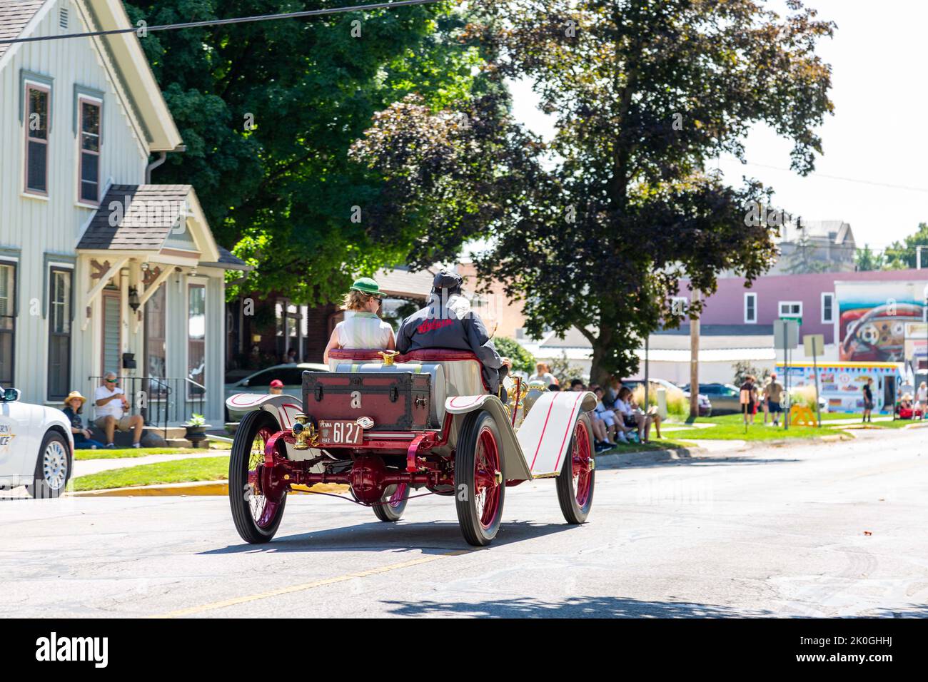A gray 1912 Auburn Model 30L Speedster participates the 2022 Auburn