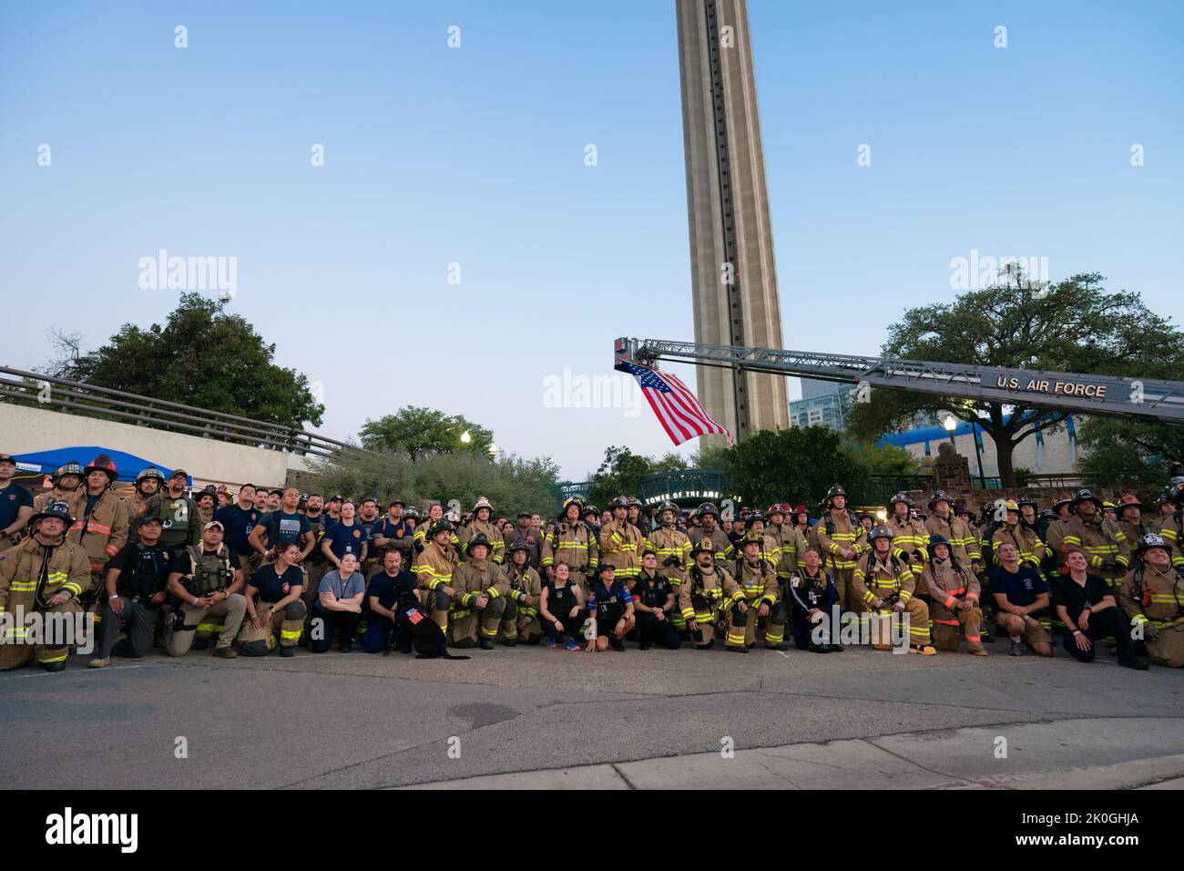 Firefighters and other first responders line up for a group photo before embarking on the San Antonio 110 9/11 memorial climb up the Tower of the Amer Stock Photo