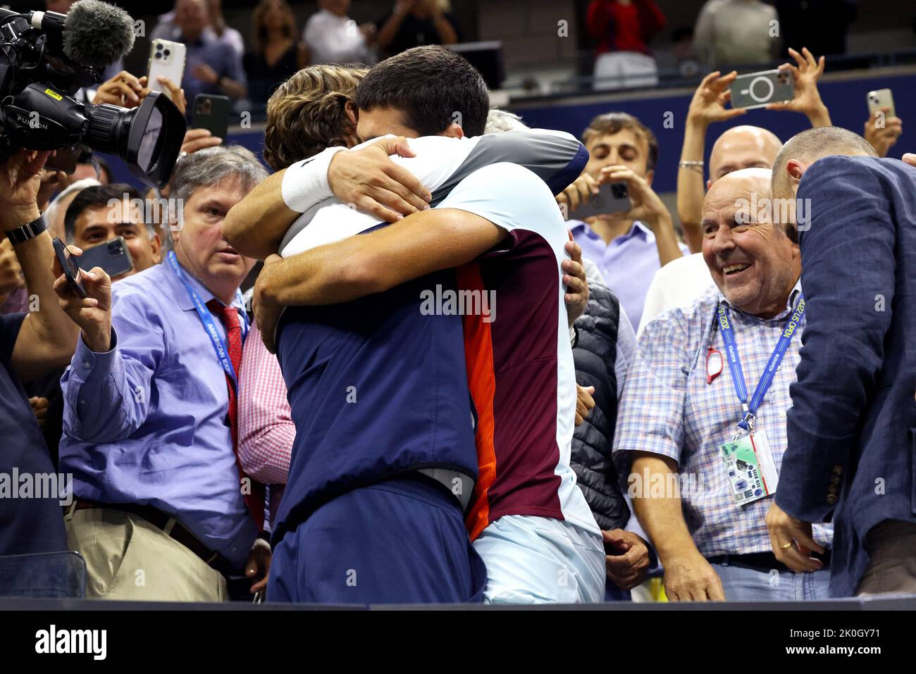 NEW YORK, NY - September 11: Men's final, Carlos Alcaraz of Spain embraces members of his team after defeating Casper Rudd of Norway in the US Open men's final at USTA Billie Jean King National Tennis Center on September 11, 2022 in New York City. ( Credit: Adam Stoltman/Alamy Live News Stock Photo
