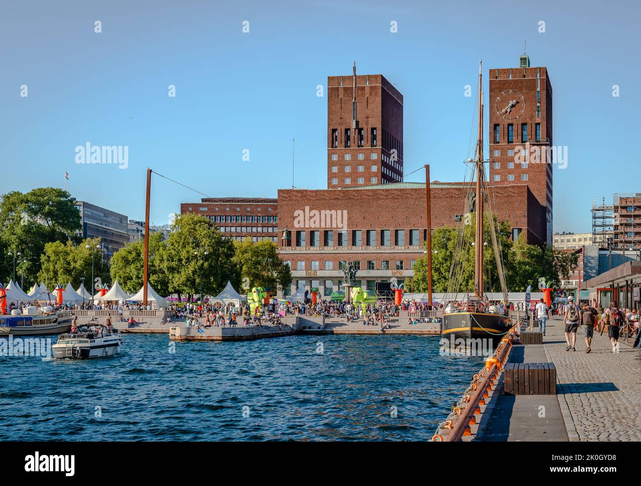Oslo, Norway - August 13 2022: The Oslo City Hall and the City Hall Square seen from the seafront on a sunny afternoon. Stock Photo