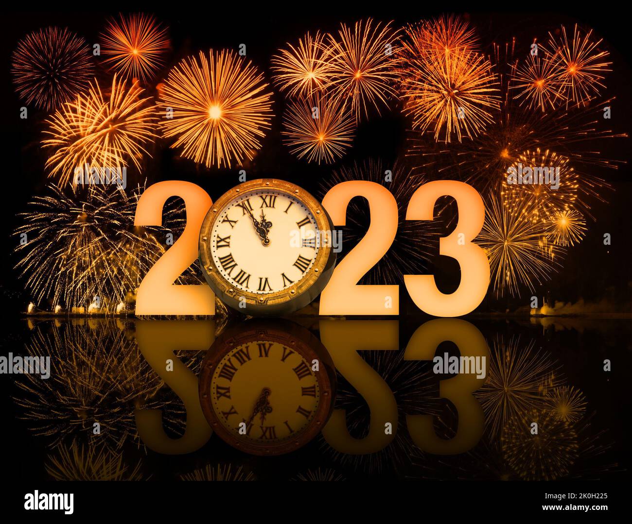 Orange 2023 happy new year fireworks with clock face Stock Photo