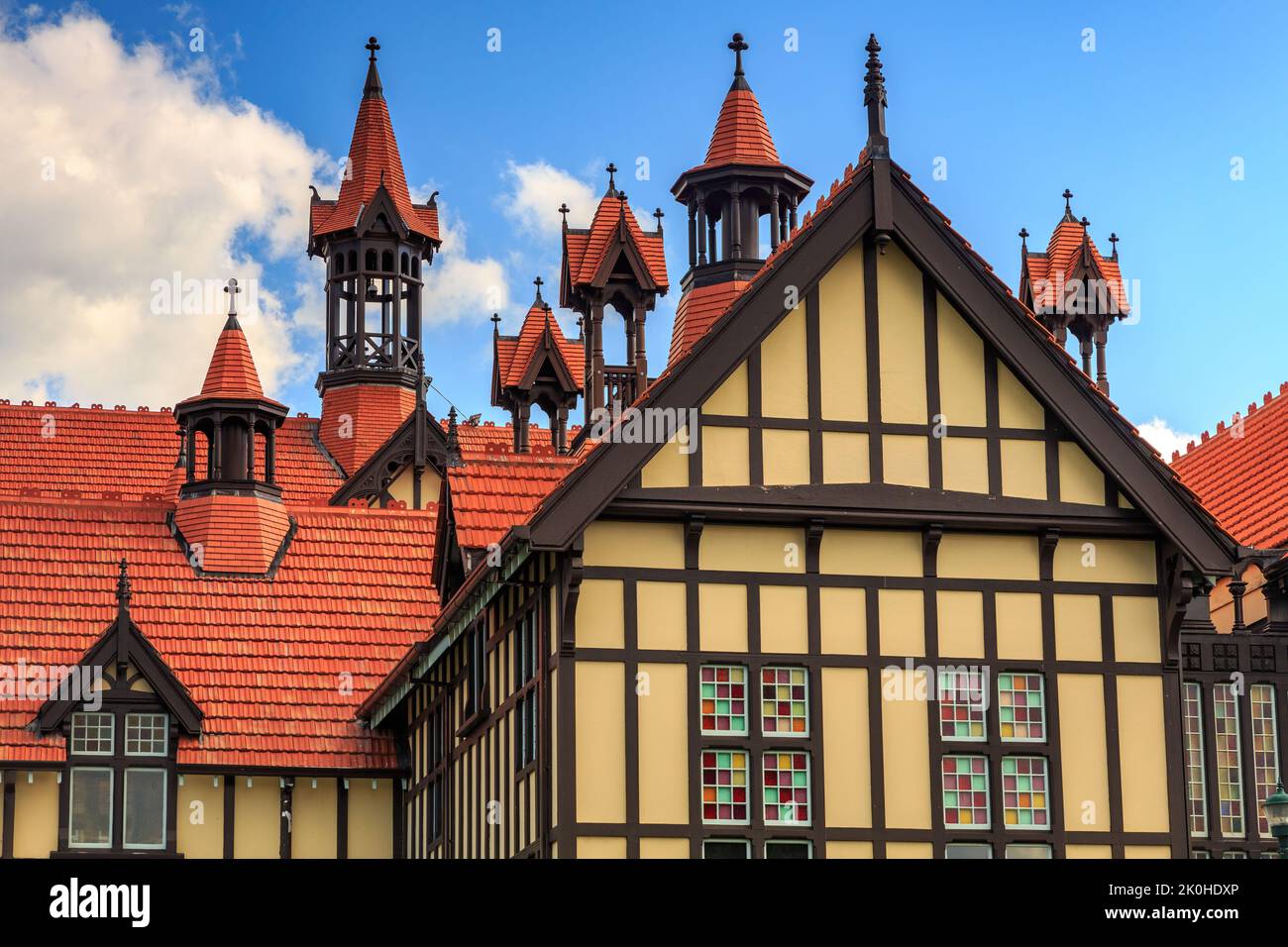 Decorative spires on the roof of the Rotorua Museum, formerly the Bath House, a 1908 Elizabethan Revival building in Rotorua, New Zealand Stock Photo