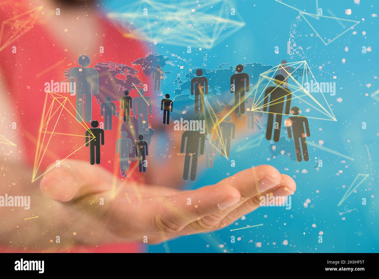 Illustrative human figures and world map floating over man's hand ...