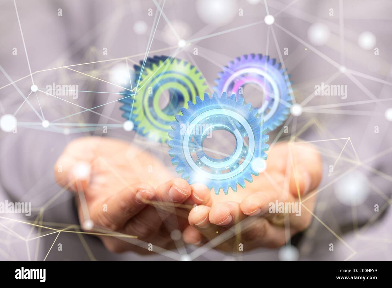 A businessman holding 3d gear in cyberspace - gear system concept Stock ...