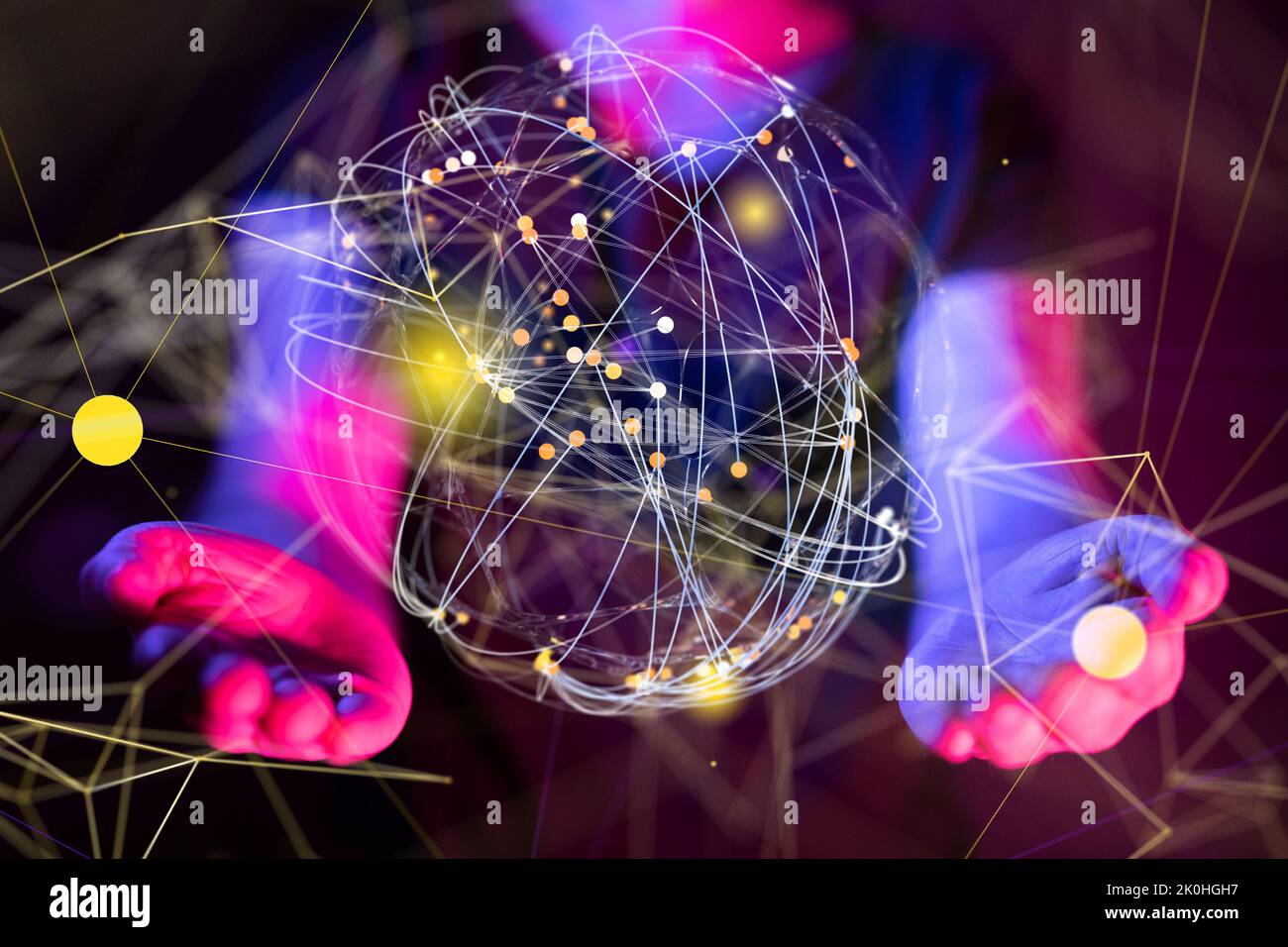 An illustrated network sphere floating above hands Stock Photo - Alamy