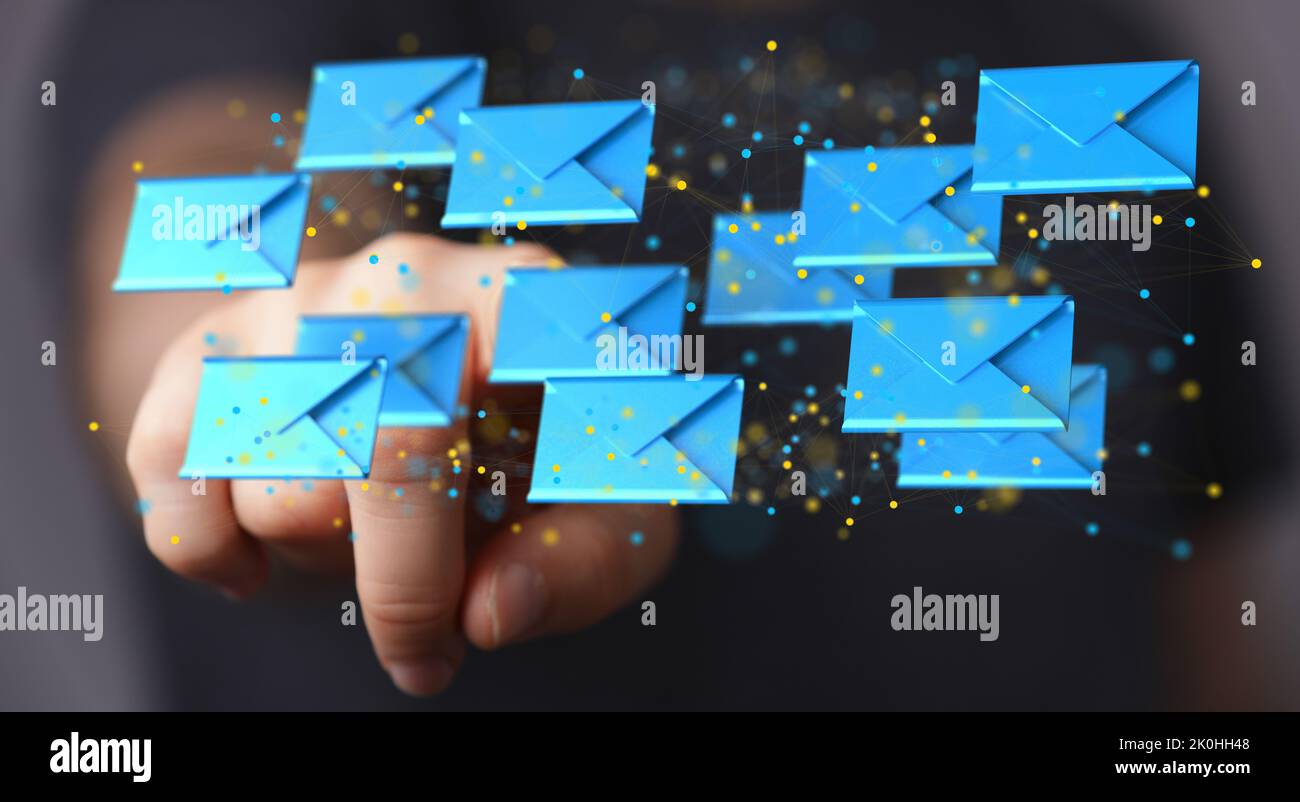 A businessman pointing to a 3D rendered hologram of blue envelope icons ...