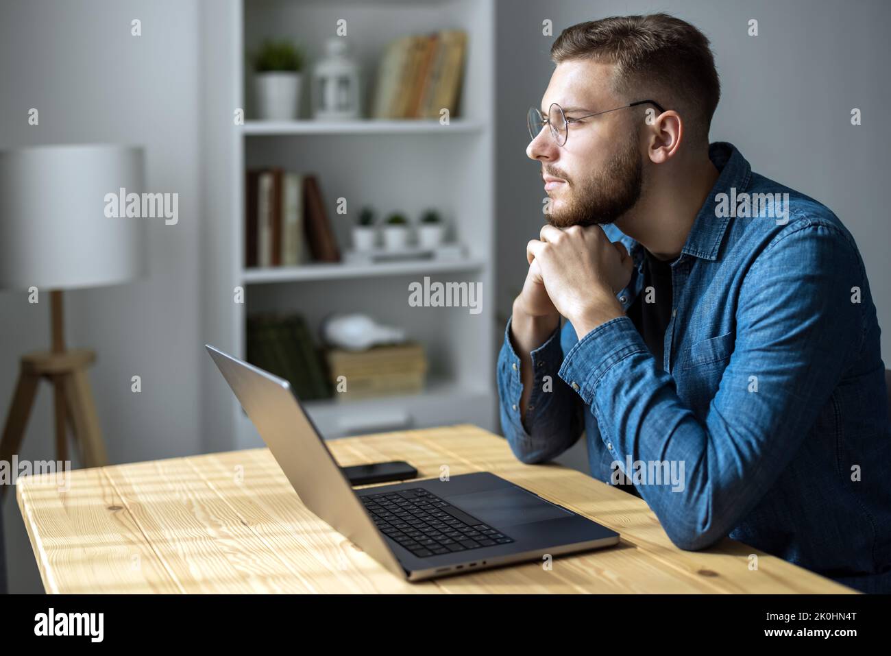 Thoughtful young man Stock Photo