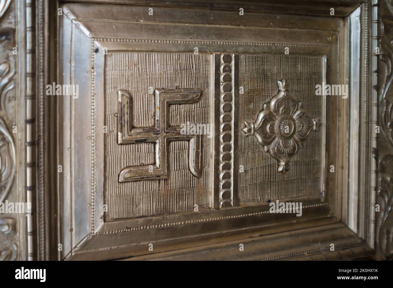The Door with a swastika in Jain temple in Mumbai Stock Photo