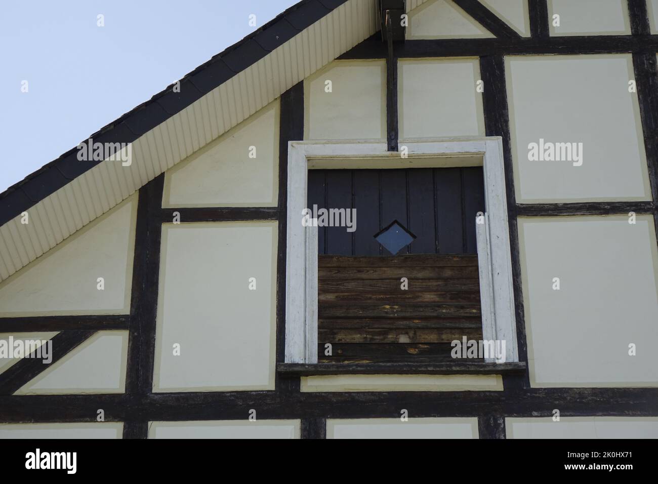 A low angle shot of an old wooden window of a house in Dahlbruch ...