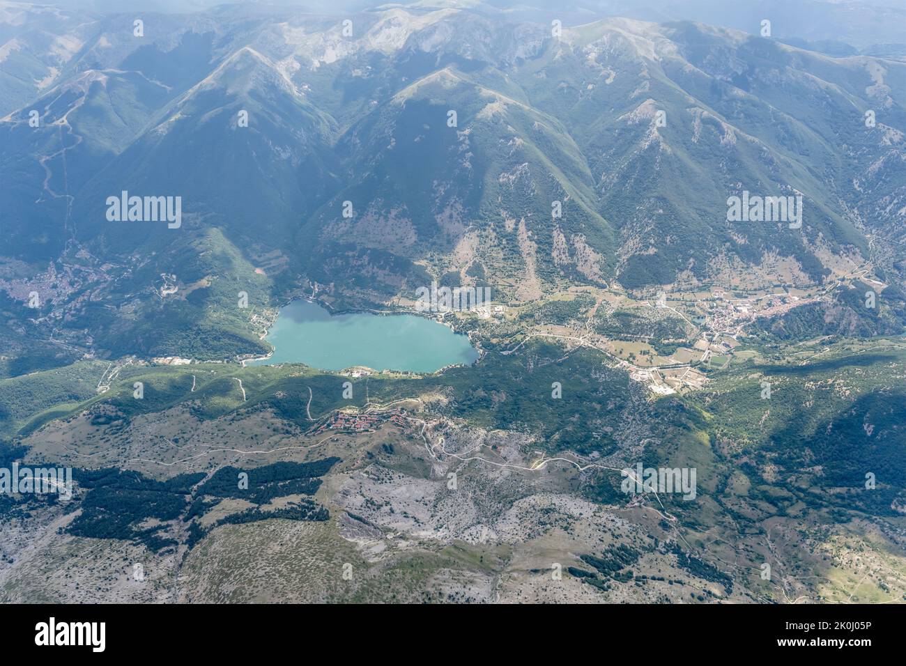 aerial shot, from a small plane, of Scanno lake in Sagittario river valley, shot from east in bright summer light, Apennines, L'Aquila, Abruzzo,  Ital Stock Photo