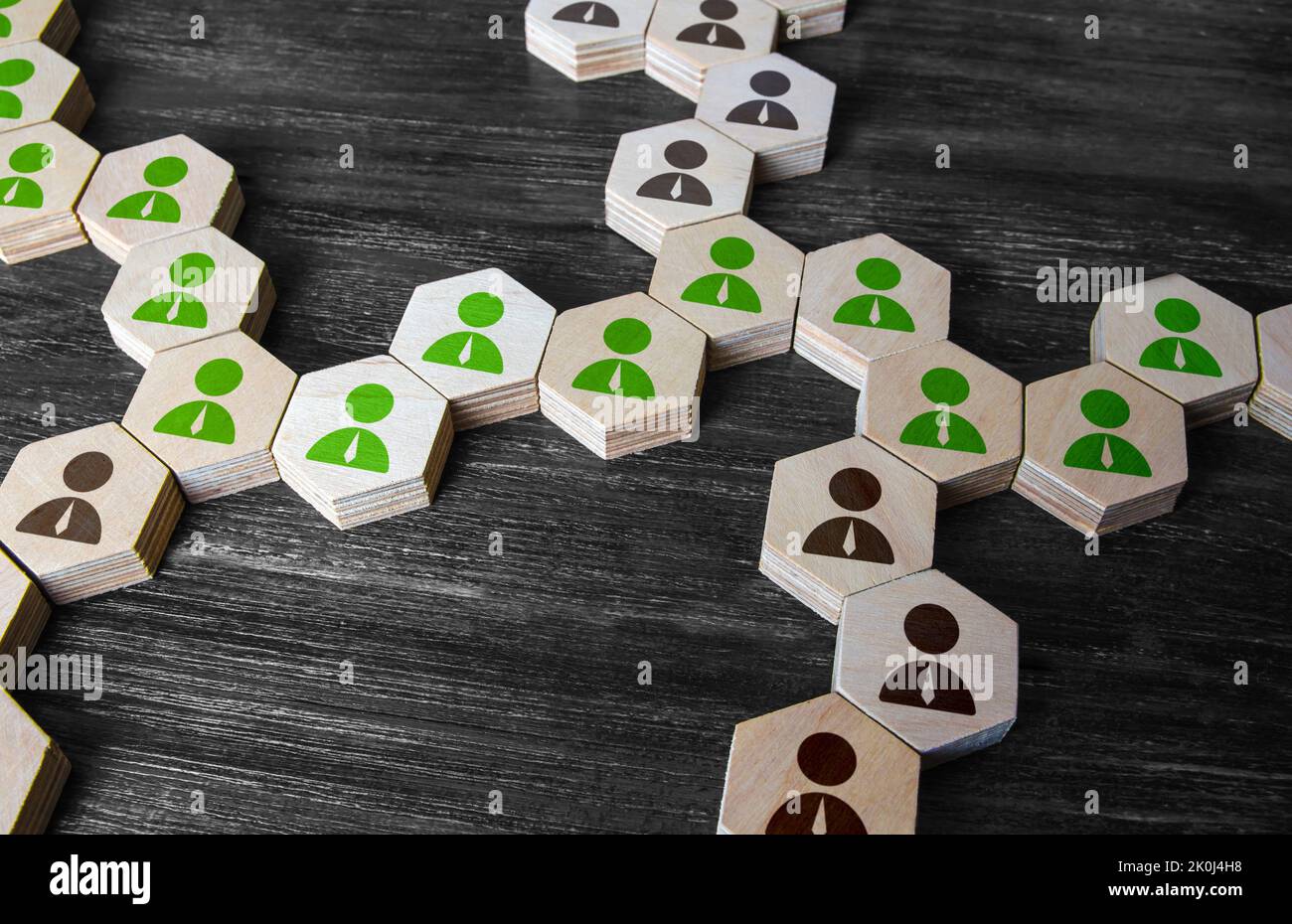 Highlighted people connection chain. Cooperation for solving tasks. Networking. Connecting of people. Assistance and collaboration. Unity and diversit Stock Photo