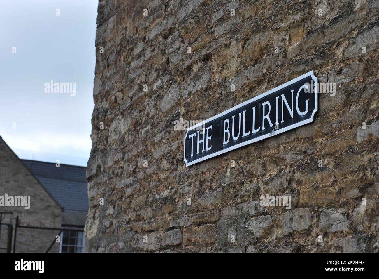 Black and White Place Name Sign for The Bullring in Thrapston, Northamptonshire, England Stock Photo