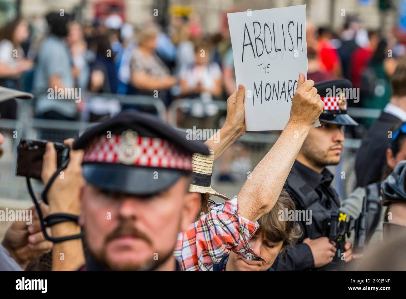 London, UK. 12th Sep, 2022. An anti Monarchist protester outside with a placard saying Not My King - King Charles III makes his first visit to Parliament with Queen Consort Camilla - Queen Elizabeth the second died last week at Balmoral Castle. Credit: Guy Bell/Alamy Live News Stock Photo