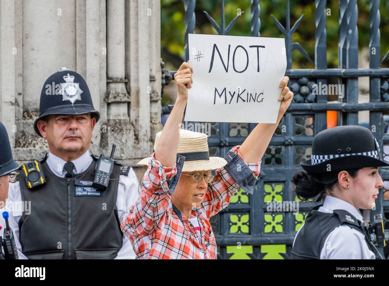London, UK. 12th Sep, 2022. An anti Monarchist protester outside with a placard saying Not My King - King Charles III makes his first visit to Parliament with Queen Consort Camilla - Queen Elizabeth the second died last week at Balmoral Castle. Credit: Guy Bell/Alamy Live News Stock Photo