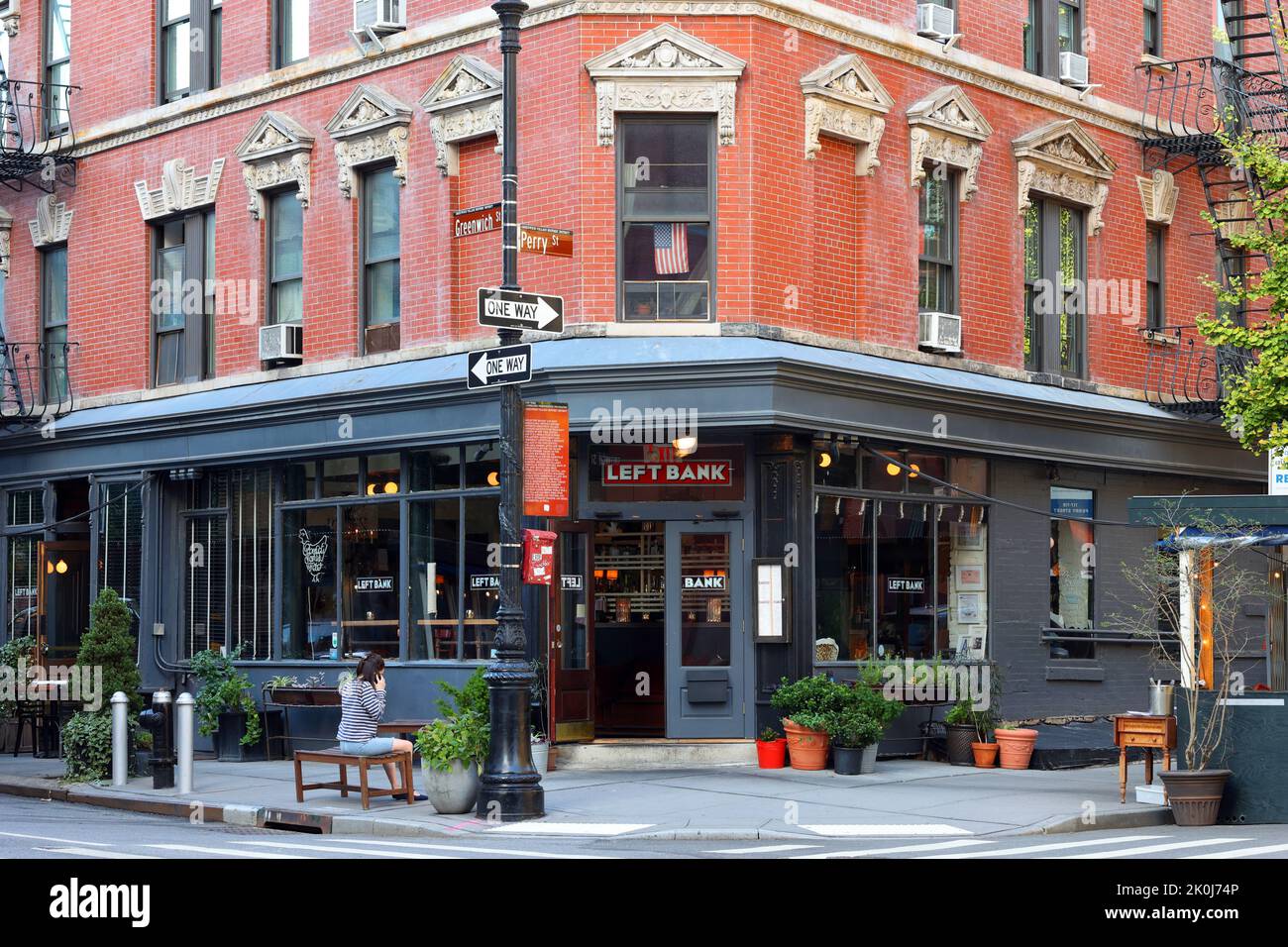 Left Bank, 117 Perry St, New York, NYC storefront photo of a restaurant in the West Village neighborhood in Manhattan. Stock Photo