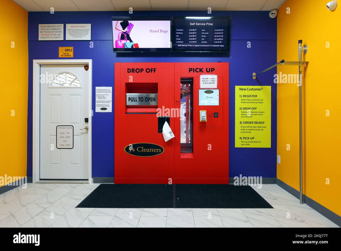 A 24hr automated dry cleaning kiosk at a J's Cleaners in New York, NY with self-service pick-up and drop off of clothing. Stock Photo