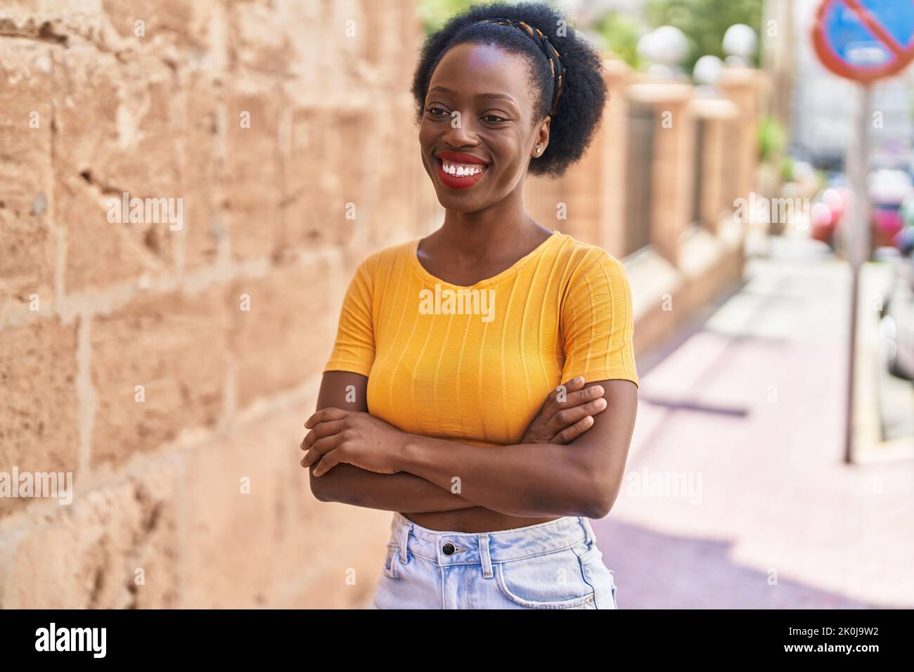 African american woman smiling confident standing with arms crossed ...