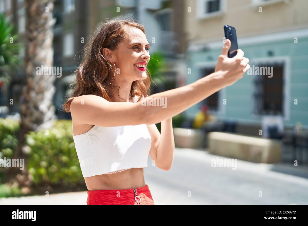 Young beautiful hispanic woman smiling confident having video call at ...