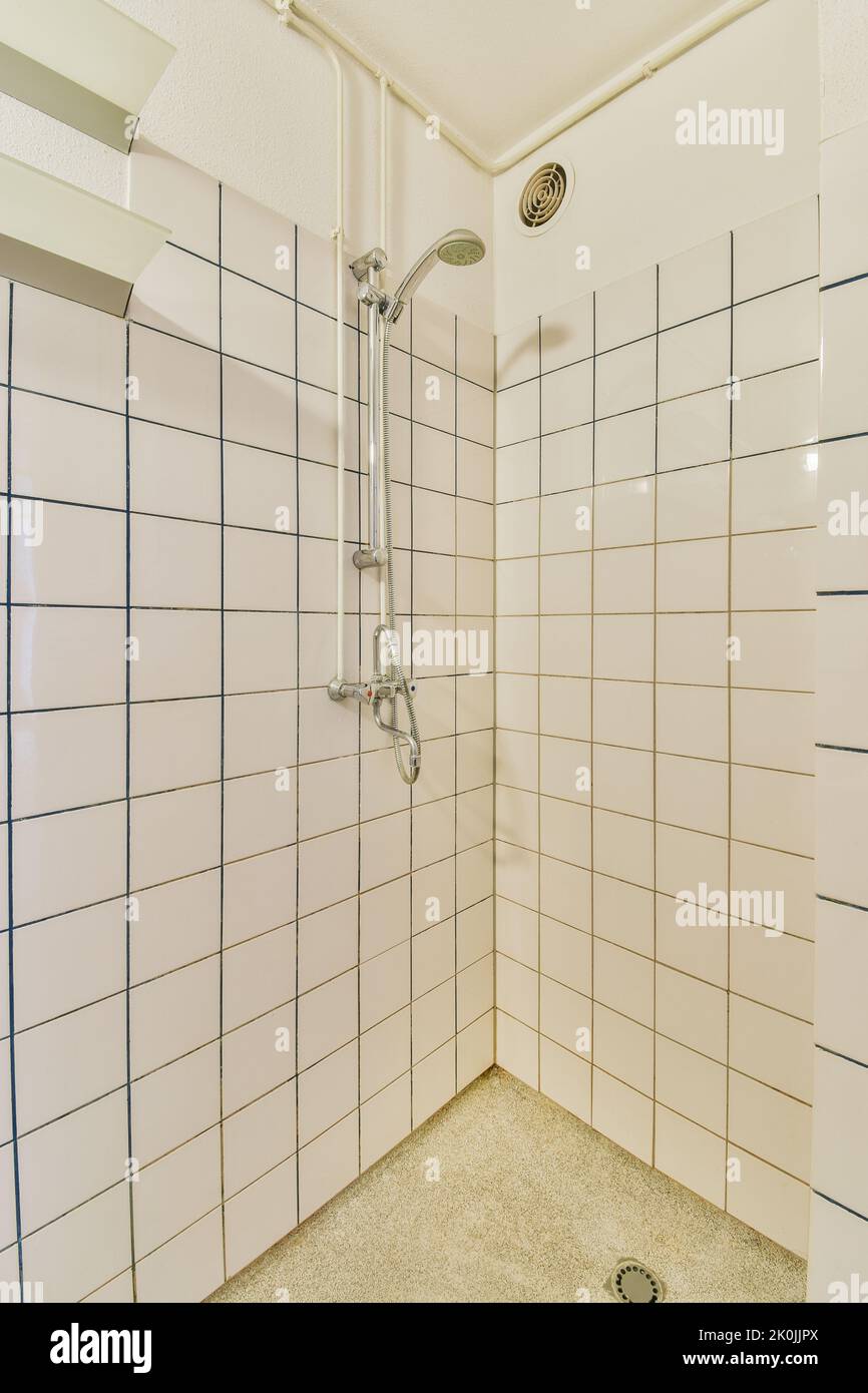 Sink and mirror located near flush toilet and shower Stock Photo Alamy