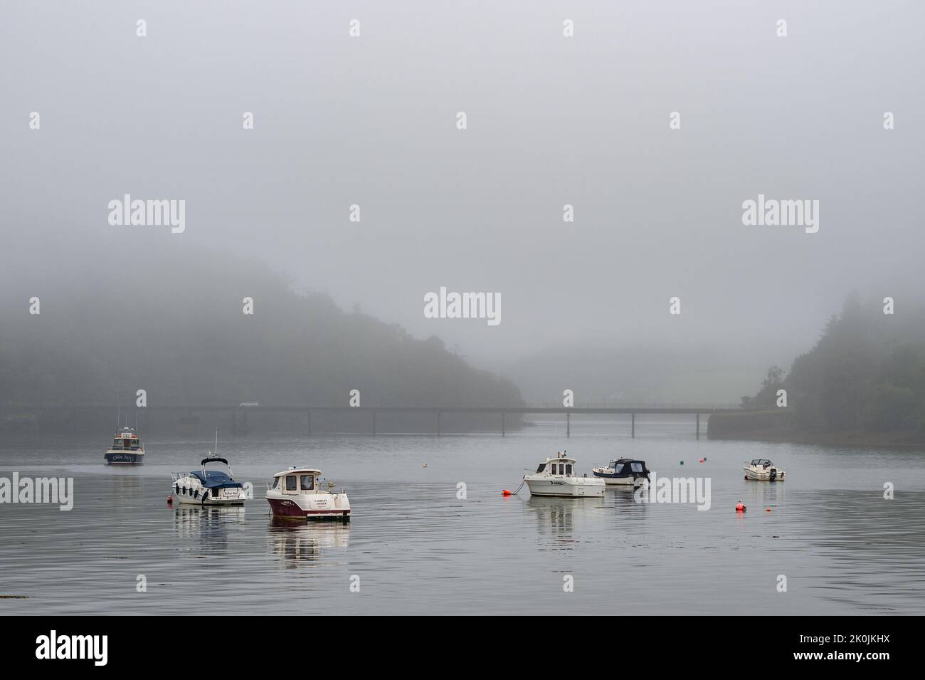 Union Hall, West Cork, Ireland. 12th Sep, 2022. Mist almost envelops Poulgorm Bridge near Union Hall on a dull and wet day in West Cork. Met Éireann has forecast brighter weather over the next few days. Credit: AG News/Alamy Live News Stock Photo