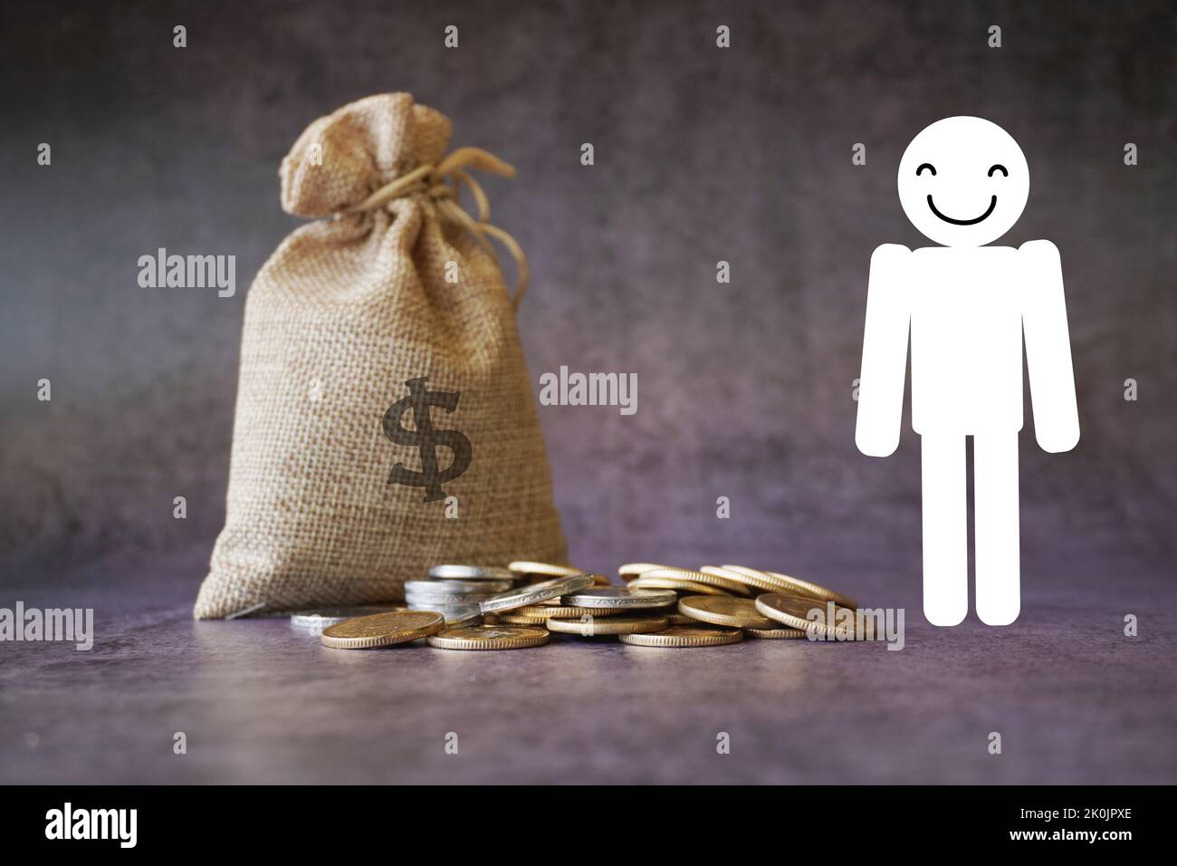 Happy man standing with money bag and coins business concept stock photo Stock Photo