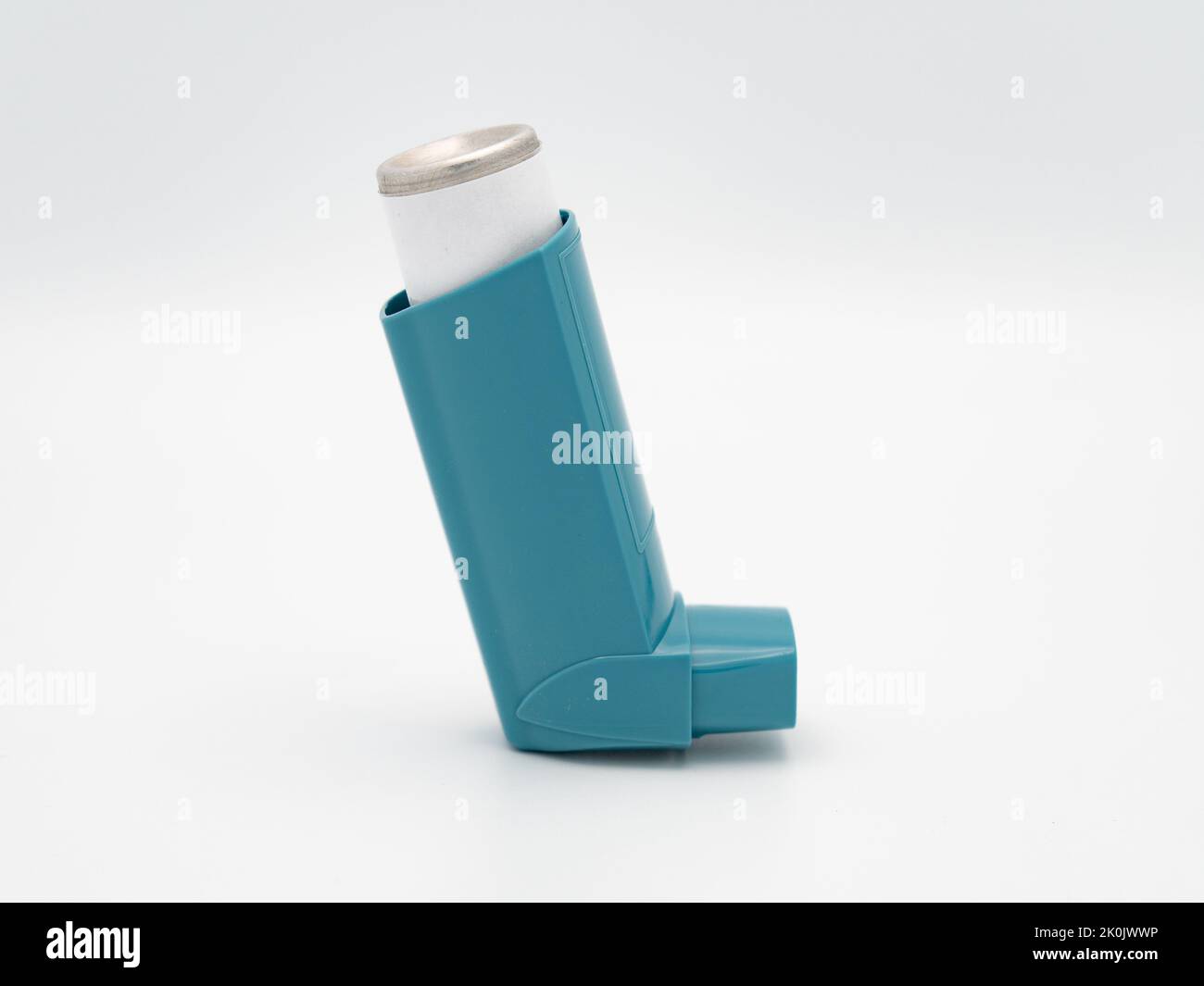 An asthma inhaler isolated on a white background Stock Photo - Alamy