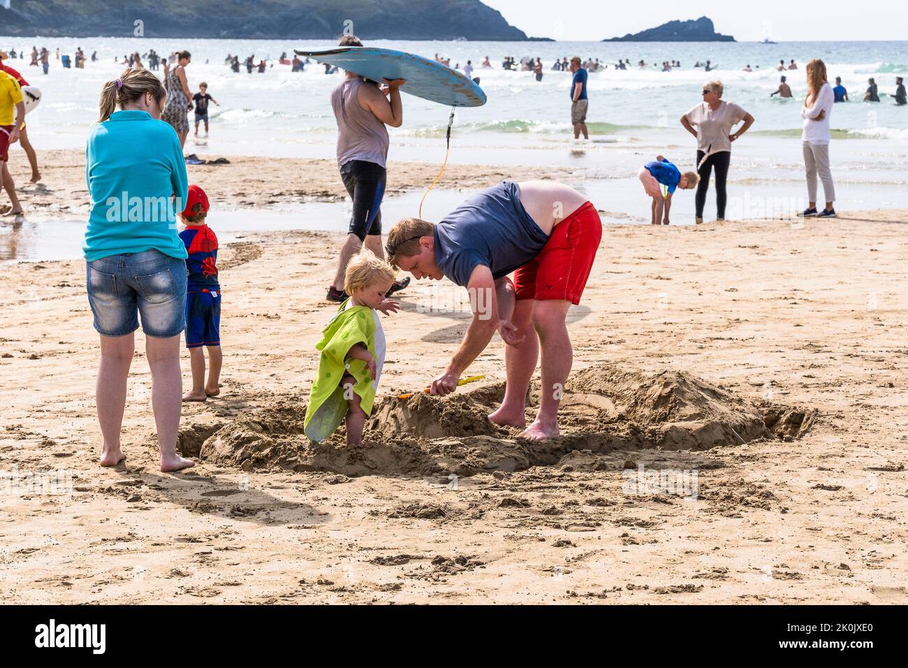 Holidaymakers enjoying themselves on Fistral Beach Newquay in Cornwall in the UK. Stock Photo