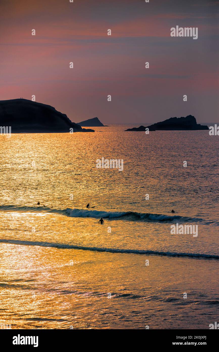 A beautiful golden light over Fistral Bay in Newquay in Cornwall. Stock Photo