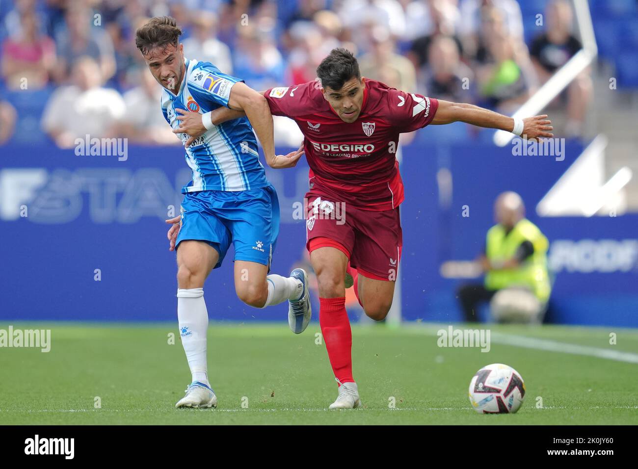Marcos Javier Acuna of Sevilla FC and Javi Puado of RCD Espanyol  during the La Liga match between RCD Espanyol and Sevilla FC played at RCDE Stadium on September 9, 2022 in Barcelona, Spain. (Photo by Bagu Blanco / PRESSIN) Stock Photo