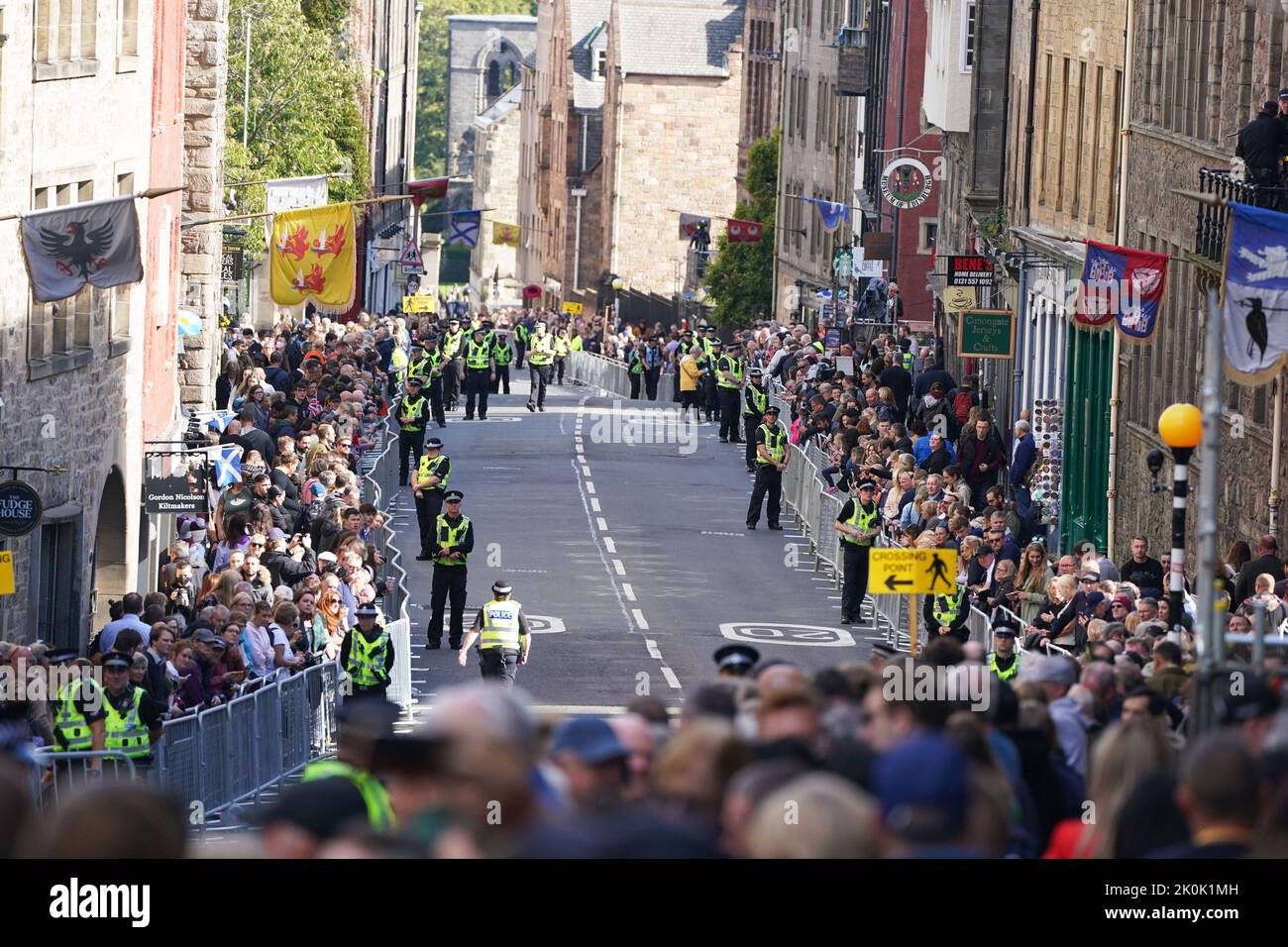 Police officers on the Royal Mile in Edinburgh ahead of the procession