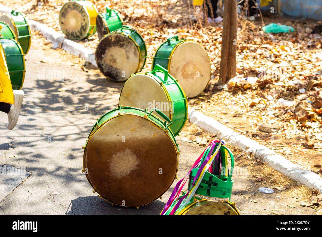 Goiânia, Goias, Brazil – September 11, 2022: Detail of some green drums kept on the floor, used during the Congadas, an Afro-Brazilian cultural Stock Photo