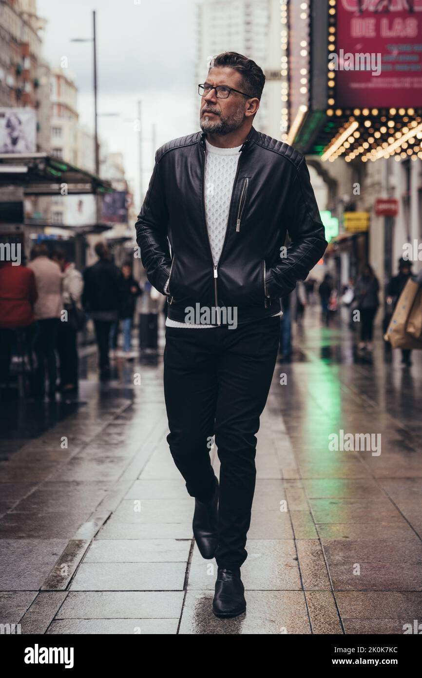 Handsome middle aged man walking hi-res stock photography and images ...