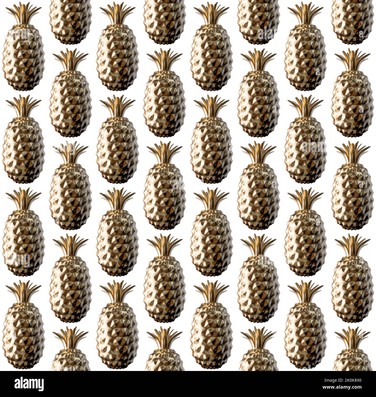 A seamless pattern of pineapples made from solid gold on an isolated background - 3D render Stock Photo