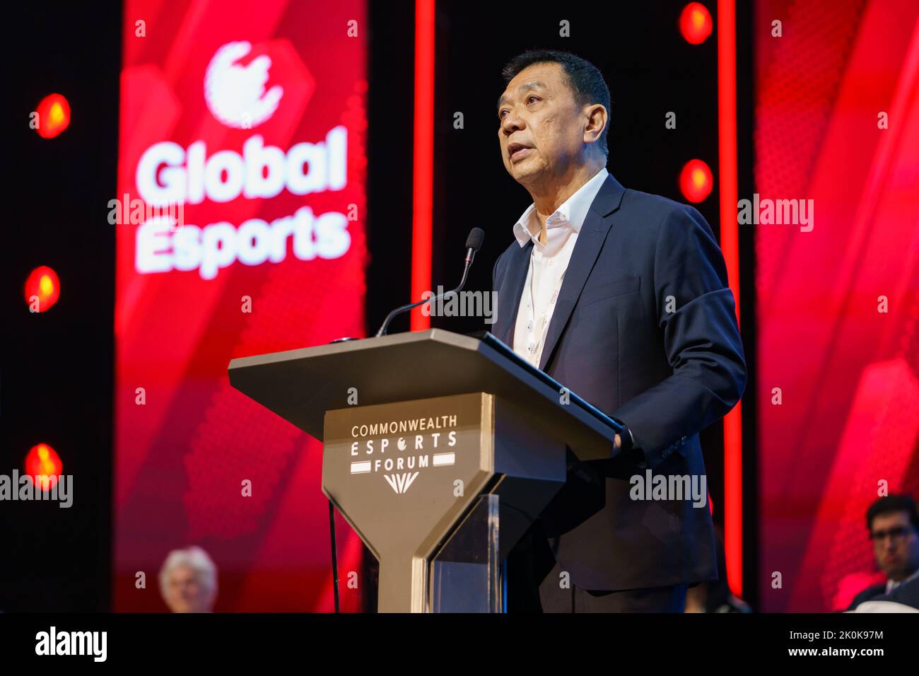 Chris Chan, President of the Global Esports Federation gives a speech at The Forum during the Commonwealth Esports Championships at the Birmingham ICC Stock Photo