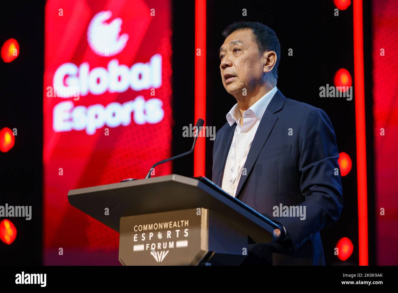 Chris Chan, President of the Global Esports Federation gives a speech at The Forum during the Commonwealth Esports Championships at the Birmingham ICC Stock Photo