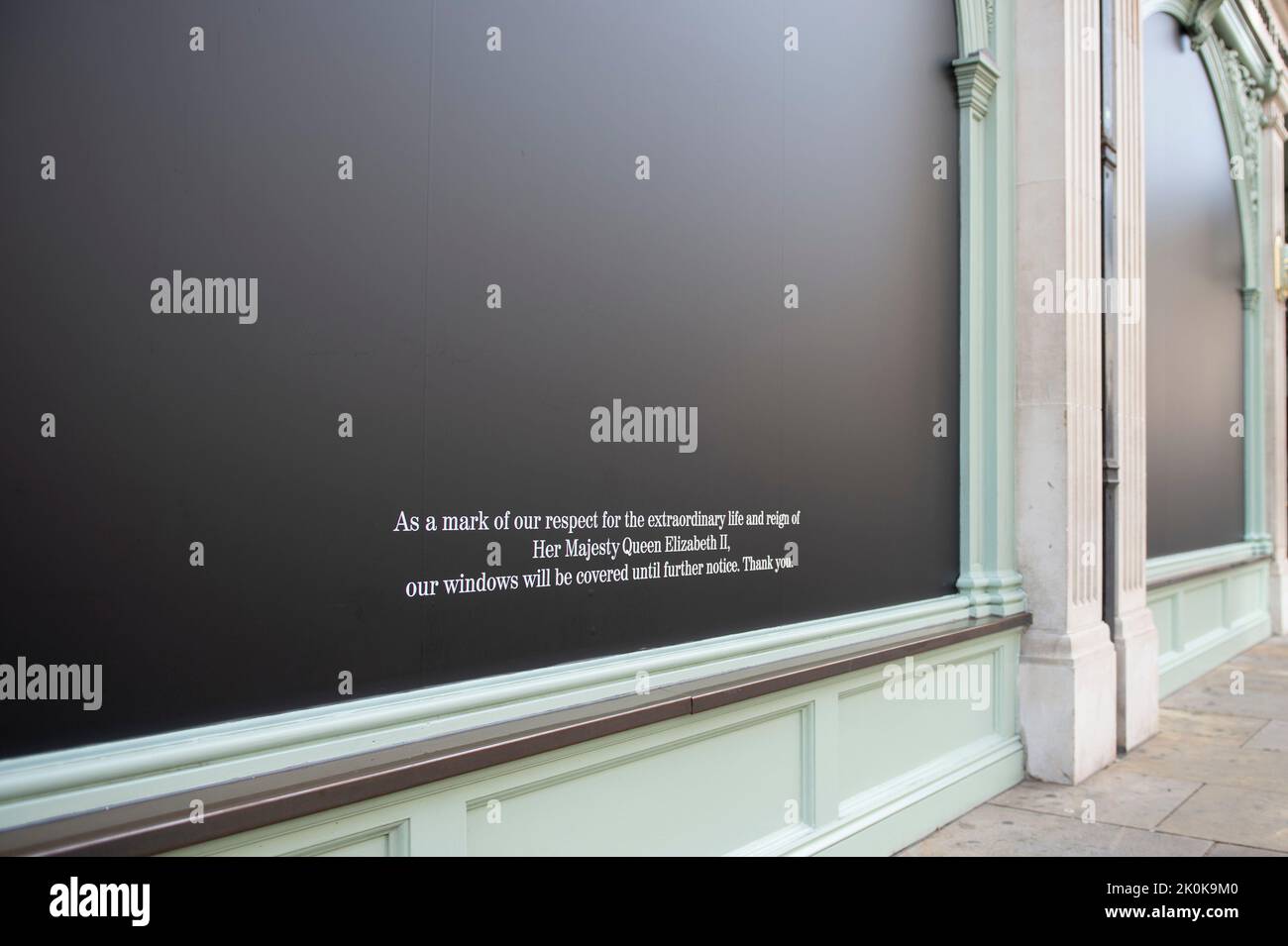 UK. 12th Sep, 2022. Fortnum and Mason's on Piccadilly pay tribute by blacking out their window